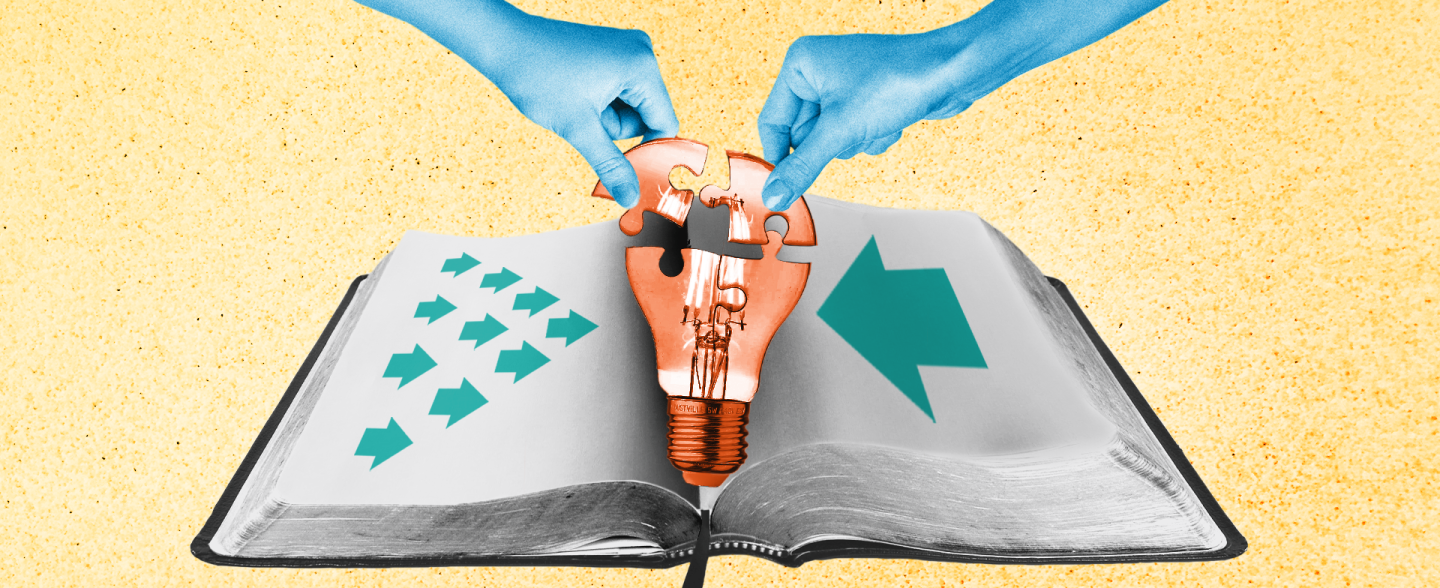 Two hands fit together a light bulb inside an open book with arrows on the page pointing towards the lightbulb 